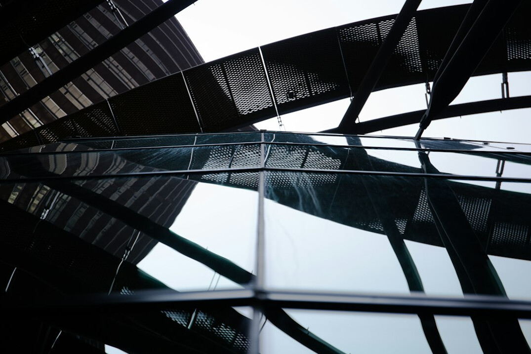 Modern glass office building from below